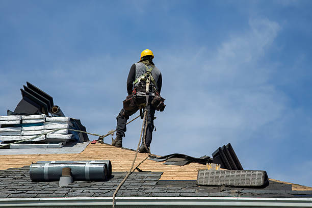 Professional Roof Replacement technician working in North Prairie, WI